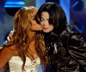 LAS VEGAS - OCTOBER 27: (TABLOIDS OUT) Singer Beyonce' Knowles and singer Michael Jackson, winner of the 2003 Humanitarian Award, hug onstage at The 2003 Radio Music Awards at the Aladdin Casino Resort October 27, 2003 in Las Vegas, Neveda. For more information on Jackson's humanitarian efforts, go to musicforgiving.org. (Photos by Kevin Winter/Getty Images)